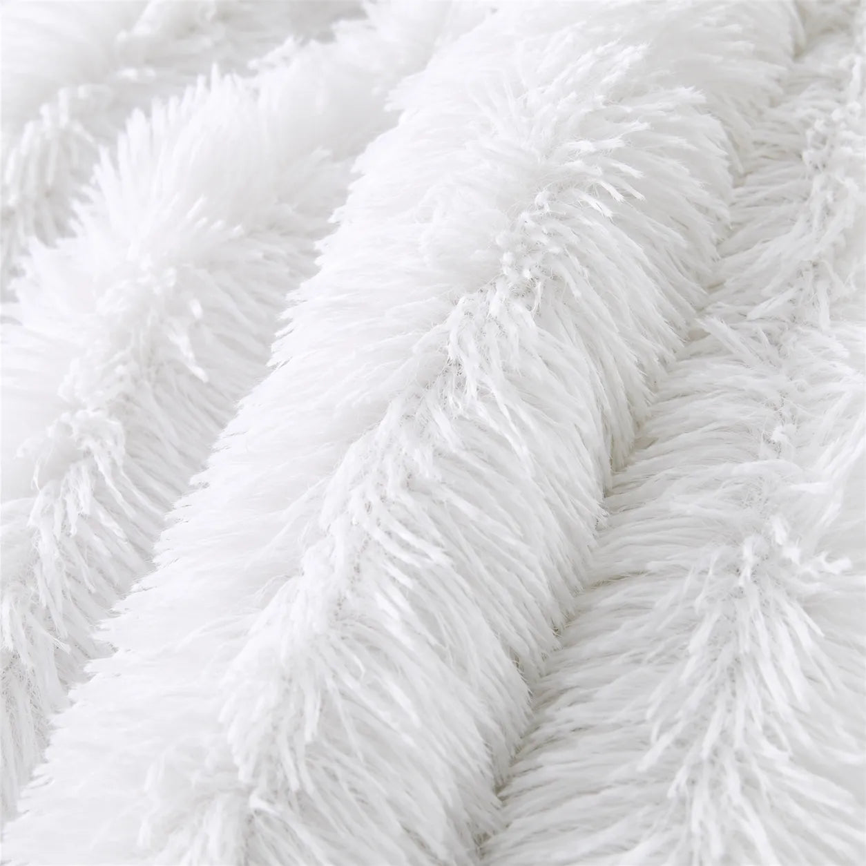 Plaid cocooning fausse fourrure