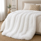 Plaid cocooning fausse fourrure