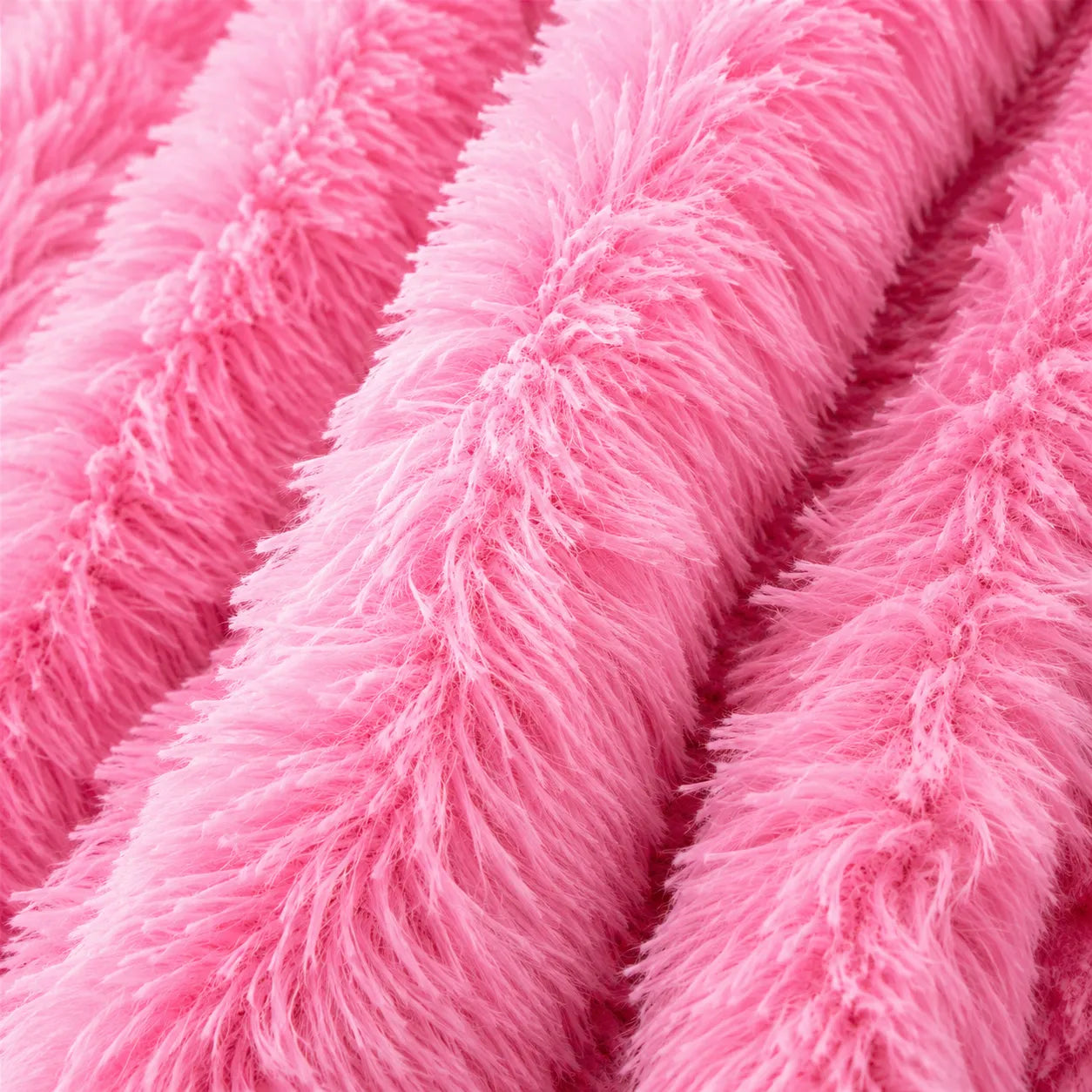 Plaid fausse fourrure rose