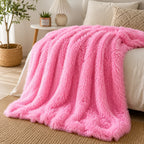 Plaid fausse fourrure rose